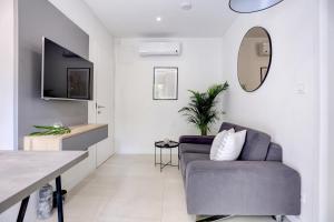 TV a/nebo společenská místnost v ubytování Apartments HUGO 2