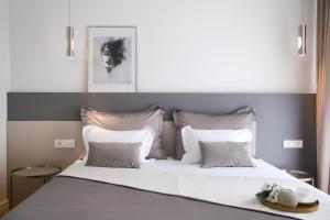 Postel nebo postele na pokoji v ubytování Apartments HUGO 2