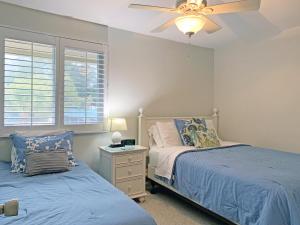 Postel nebo postele na pokoji v ubytování Siesta Beach House 5950 #311 + 27 fotografií