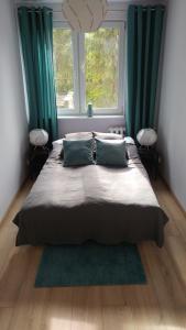 Posteľ alebo postele v izbe v ubytovaní Sea & Sand Apartment