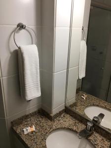 Koupelna v ubytování Ideal Praia Hotel