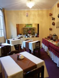 Restorāns vai citas vietas, kur ieturēt maltīti, naktsmītnē Huaytusive Inn Hotel