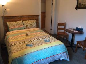 Postel nebo postele na pokoji v ubytování Historic Hotel Bayview