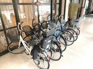 a row of bikes parked inside of a building at Grand Earl Hotel in Douliu