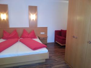 Кровать или кровати в номере Appartement Auer