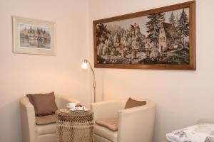 Posedenie v ubytovaní Deluxe Apartments