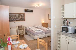 Kuchyňa alebo kuchynka v ubytovaní Deluxe Apartments