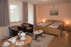 Posteľ alebo postele v izbe v ubytovaní Deluxe Apartments