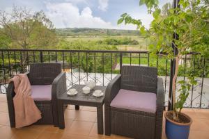 Balkón alebo terasa v ubytovaní Deluxe Apartments