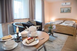 Posedenie v ubytovaní Deluxe Apartments