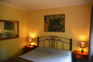 Ένα ή περισσότερα κρεβάτια σε δωμάτιο στο Avoca Cottages VICTORIA