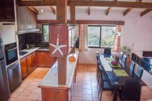 a kitchen with a star on the counter in it at Harbour Views in Port Vila