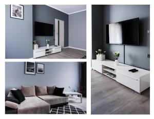 a living room with a couch and a tv on a wall at Apartamenty France Faktura VAT in Koszalin