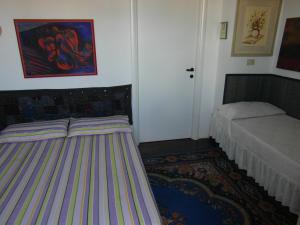 Postel nebo postele na pokoji v ubytování Abitazione Pigneto B&B