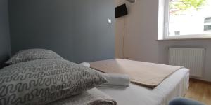 Postel nebo postele na pokoji v ubytování 999 Aparthostel