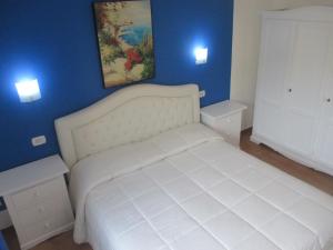 Posteľ alebo postele v izbe v ubytovaní Palinuro casa vacanze "Donna Antonia"