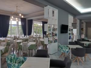 TV a/nebo společenská místnost v ubytování Hotel Aethria