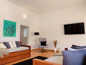 TV a/nebo společenská místnost v ubytování Luki Home