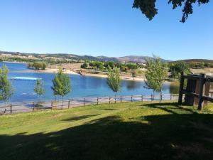 a park with a view of a river at Casa do Azibo in Santa Combinha