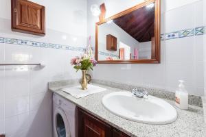 Ein Badezimmer in der Unterkunft El Sitio La Rosa