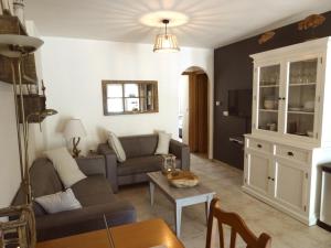 a living room with a couch and a table at Rascasa 2/5 in La Mata