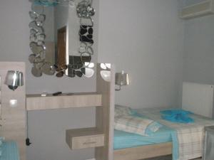 Posteľ alebo postele v izbe v ubytovaní Blue Dream Hotel