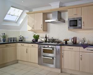 Una cocina o zona de cocina en Berkshire Rooms Ltd - Gray Place