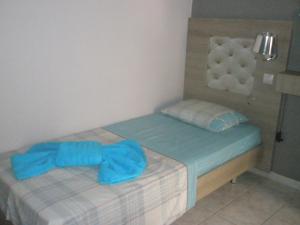 Posteľ alebo postele v izbe v ubytovaní Blue Dream Hotel