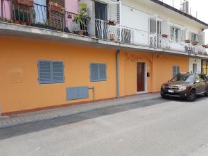 a car parked on the side of a building at The Dream in Marina di Carrara