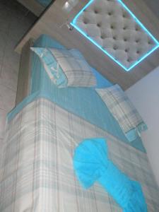 Posteľ alebo postele v izbe v ubytovaní Blue Dream Hotel