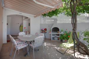 Patio nebo venkovní prostory v ubytování Villa Nedika