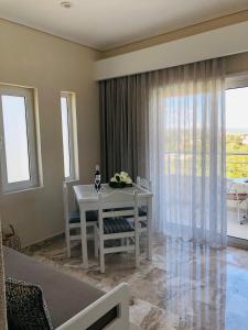 Posedenie v ubytovaní Maria Suites