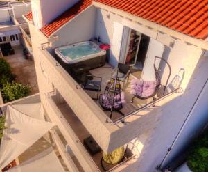 an overhead view of a house with a swimming pool at Dubrovnik Icy Guest House in Dubrovnik