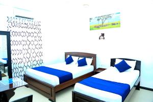 Voodi või voodid majutusasutuse Blue Diamond Resort toas
