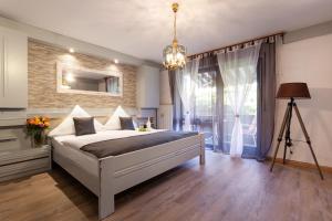 Säng eller sängar i ett rum på Hotel Petra
