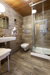 Ein Badezimmer in der Unterkunft Hotel Petra