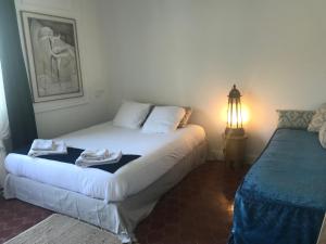 Postel nebo postele na pokoji v ubytování MOODz HOTEL VIENNE