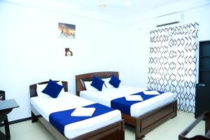 Voodi või voodid majutusasutuse Blue Diamond Resort toas