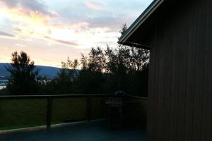 a view from the porch of a house at Björkin – Cozy Cabin with excellent view in Akureyri