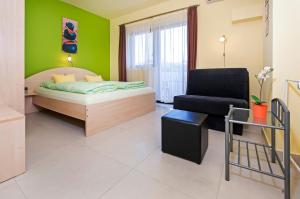 Postel nebo postele na pokoji v ubytování Apartments Erik B&B Adults only