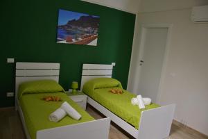 En eller flere senge i et værelse på B&B Stella Maris Trapani Centro