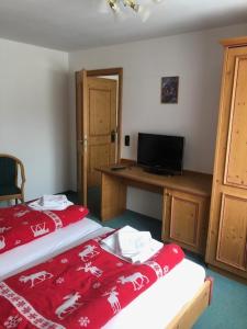 Letto o letti in una camera di Norishütte