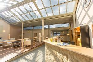 Η κουζίνα ή μικρή κουζίνα στο T3 Cityloft Appartments