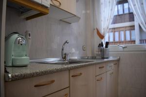 A kitchen or kitchenette at El Pozu las Ranas