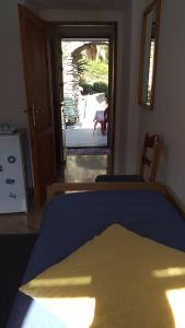 Postel nebo postele na pokoji v ubytování La camera del mulino