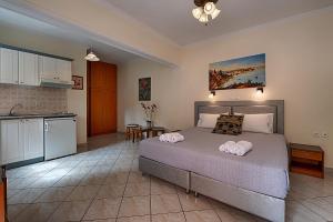 Postel nebo postele na pokoji v ubytování Angelica Hotel