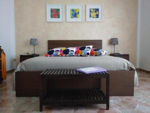 A bed or beds in a room at Appartamento Il Mandorlo - Custonaci