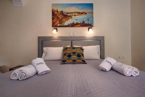 Postel nebo postele na pokoji v ubytování Angelica Hotel