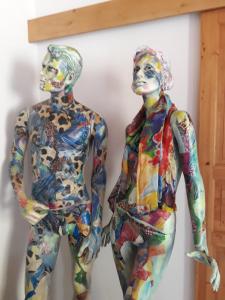 a couple of mannequins standing next to each other at Pension Polsterrinne in Sankt Lorenz