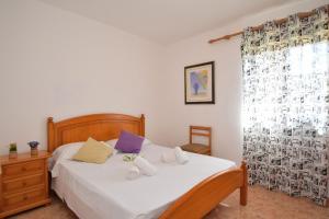 Ένα ή περισσότερα κρεβάτια σε δωμάτιο στο 145 Casa Ca Na Coloma ETV5130 by Mallorca Charme